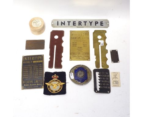 2 military button sticks, and a collection of Intertype metal machine plaques 