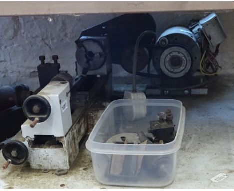 A bench-mounted watchmaker's/toolmaker's lathe 