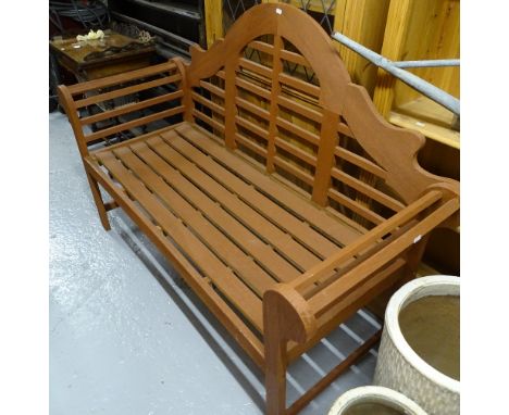 A Lutyens style slatted garden bench, L154cm 