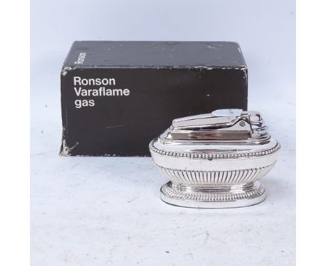 A Ronson Varaflame gas chrome table lighter, length 9cm, original box 