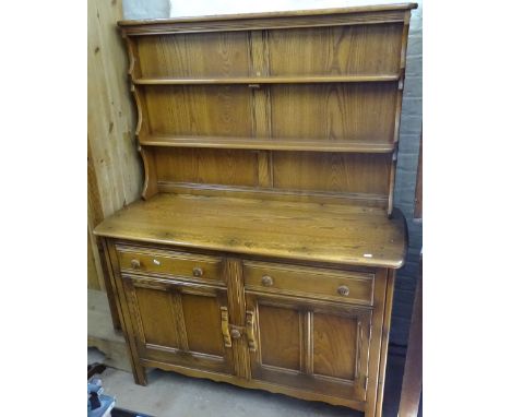 An Ercol elm Welsh dresser (Golden Dawn range), W121cm 