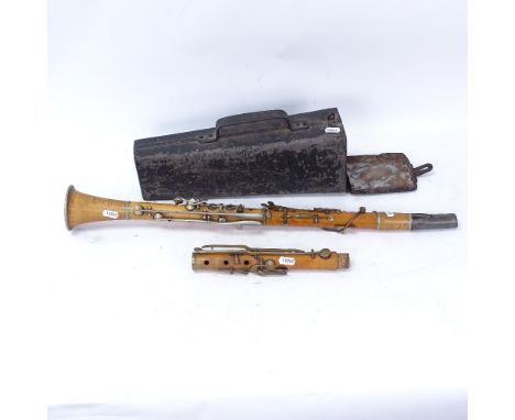 A Butler of Haymarket clarinet, with Dawe &amp; Son rosewood mouthpiece, and black painted tin carrying case 