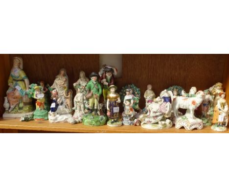 A shelf of various 19th century and other figures, including Derby and Staffordshire (A/F) 