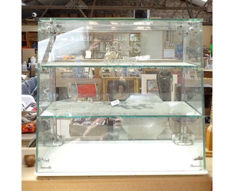 A Vintage Lyons Cakes clear and milk glass table-top display case, width 51cm, height 47cm, depth 31cm 