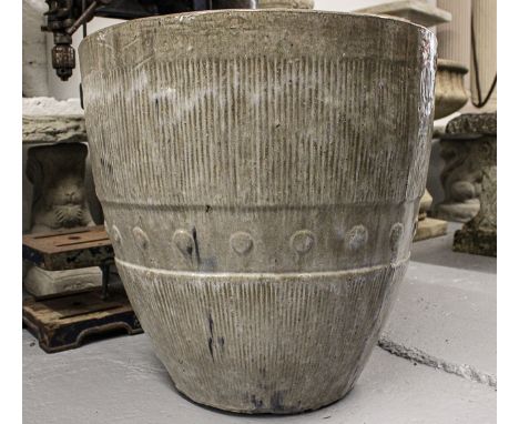 A large circular glazed ceramic planter, H52cm 
