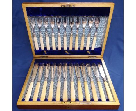 An Elkington &amp; Co silver plated fish service for 12 people (lacking 1 fork), in fitted case, and 2 pairs of cased fish se