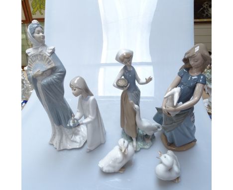 A Lladro Goose Girl, 24cm, a Lladro Child in Nightgown, and 4 NAO figures