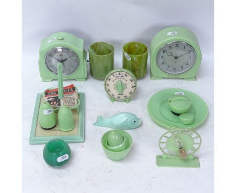 A collection of Art Deco green plastic kitchen items, including egg boiler, Smith's timer etc 