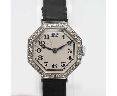 A vintage diamond cocktail watch with arabic numerals of octagonal design