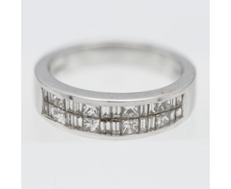 Iliana- an 18k white gold and diamond channel set ring, approx. 7.2g, size O.