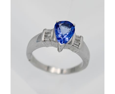Am 18k white gold diamond and tanzanite ring, size O.