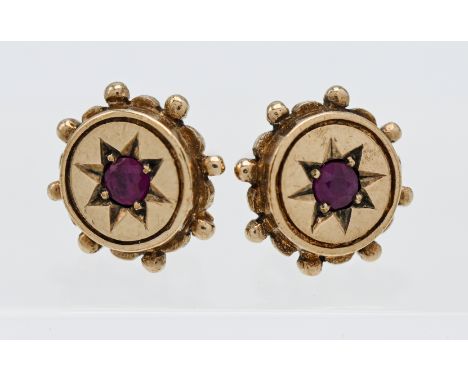 A pair of 9ct gold and ruby earrings, 2.70g.