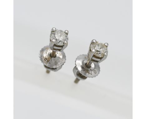 Iliana- an 18k white gold diamond earrings, with receipt.