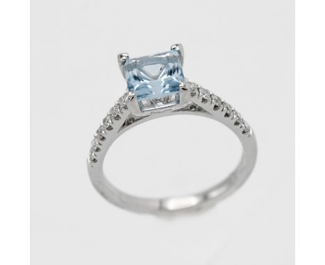 An 18ct white gold aquamarine and diamond ring, size N.