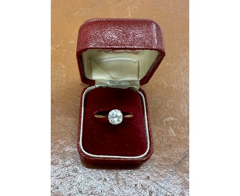 An 18ct yellow gold and platinum diamond solitaire ring, with old brilliant cut diamond of good colour and clarity, approx 1.