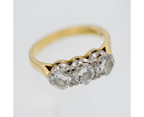 An 18ct three stone diamond ring, size J