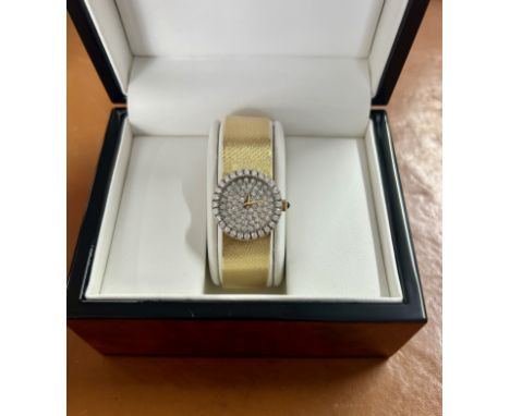 Baume &amp; Mercier a pave diamond set ladies diamond 18ct gold wristwatch, backplate numbers 818995, 36651, 989, boxed.