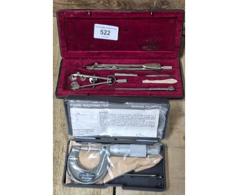 Two boxed tools; Boxed Mathematical set and Mitutoyo Micrometer. 