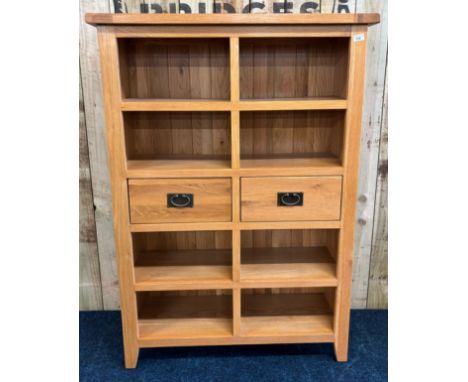 Contemporary solid light oak sectioned unit. Having two centre drawers. [141x100x36cm] 