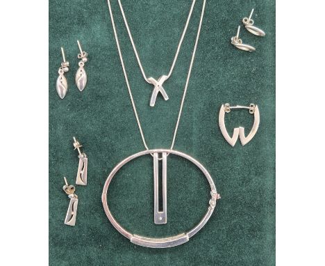 A Collection of 925 silver and diamond stone jewellery [hot diamonds], Bangle, Two pendants and chains and four pairs of vari