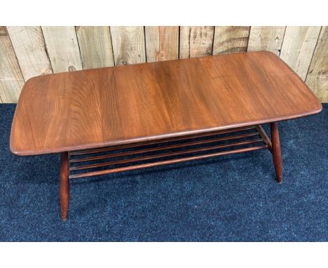 Ercol Elmwood coffee table. Having spar shelf area. [37x104x46cm] 