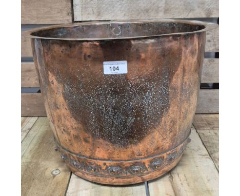 Antique copper worked planter- showing rivet design. [29cm high, 42cm diameter]