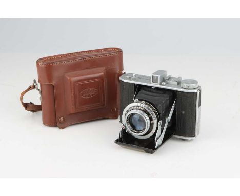 An Olympus Six `Folding Camera,with an Olympus Zuiko 75mm f/2.8 lens, body G, shutter working, optics P-F, fungus and haze pr