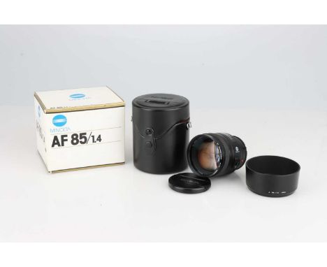 A Minolta AF f/1.4 85mm Lens,black, serial no. 19301255, body, E, elements, G-E, one fungal patch internally, complete with m