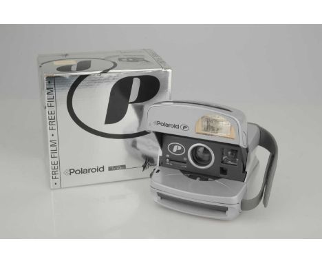 A Polaroid P Instant Camera,takes widely available type 600 film, camera powers on and ejects dark slide when dummy cartridge