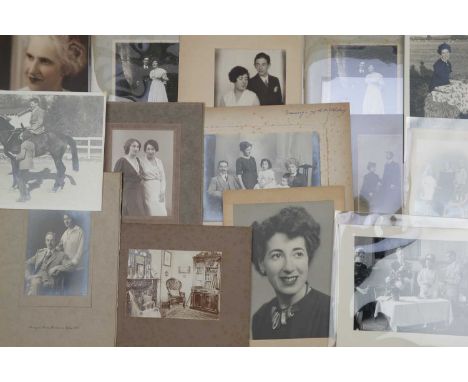 Isenthal Family Portrait Collection,collection of large formal portrait images from the 1920s - 1960s, most in card folders, 