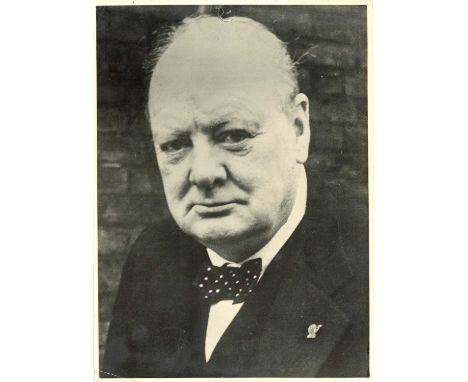 A Winston Churchill Portrait Photograph,vintage gelatin silver print of Churchill outside Downing Street in 1941 with thumbs-