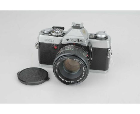 A Minolta XG-1 SLR Camera,chrome, with Minolta MC Rokkor-PF f/1.7 50mm lens, body, VG, shutter working, lens, VG