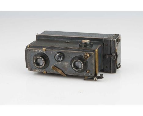 A Jules Richard Verascope Stereo Camera,grey, shutter working, body F-G, optics, F, slight fungus and haze present.