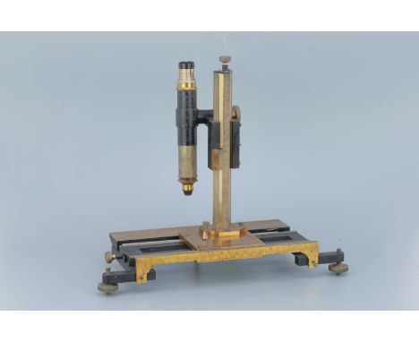 A Vernier / Travelling Microscope,English, c.1900 unsigned, on brass base with two levelling feet, with scale to the base and