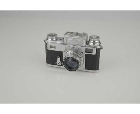 A Contax III Rangefinder Camera,chrome, with a Carl Zeiss Jena Sonnar 50mm f/2 lens, body F-G, shutter working but slow speed