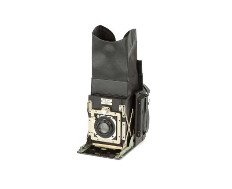 A Newman &amp; Guardia Folding Reflex Camera,1921-30, 6.5x9cm, black, serial no. FR564, with Ross Xpres f/4.5 136mm lens, bla