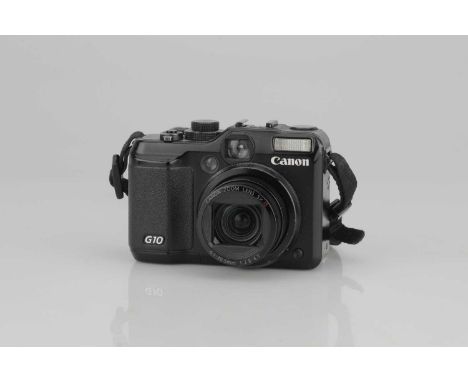 A Canon Powershot G10 Digital Compact Camera,powers up, with battery and charger