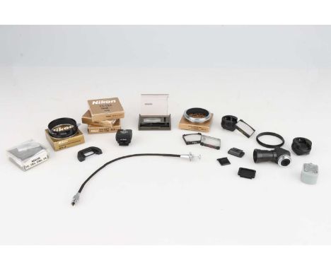 A Good Selection of Nikon Camera Accessories,including right angle finter, flash adapters, focusing screens and more (a lot)