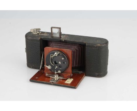 An Interesting Unmarked Roll-Film Camera,6x9cm, with shuttered lens with rotary Waterhouse stops, body, VG, shutter working, 