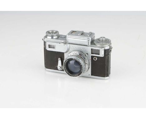 A Contax III Rangefinder Camera,chrome, with a Carl Zeiss Sonnar 50mm f/2, body G, shutter behaviour dubious, lens optics F, 