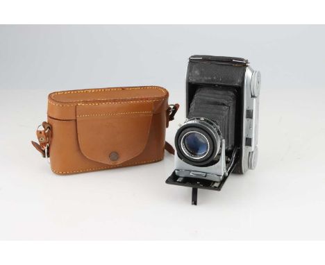 A Voigtlander Bessa II Rangefinder Camera,chrome, with Voigtlander Color-Heliar f/3.5 105mm lens, body, G, shutter working, l