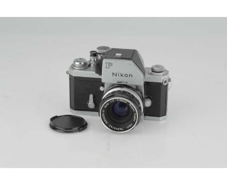 A Nikon F Photomic FTn SLR Camera,chrome, serial no. 7082303, with Nikon Nikkor-H f/2 50mm lens, black, serial no. 865162, bo