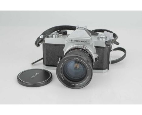 A Nikon Nikkormat FT3 SLR Camera,with Vivitar f/2.5 28mm lens, body, G-VG, shutter working, lens, G-VG, some light internal h