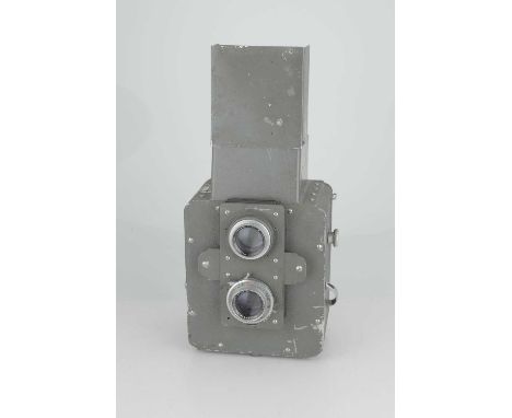 A Mac Van MFG 4x5 TLR Camera,olive/grey, with Wollensak Raptar 7Â½" f/4.5, body F-G, shutter working but sticks on slower spe