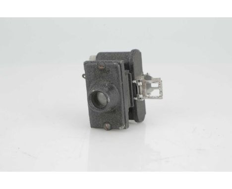 A United Optical Merlin Sub-Miniature Camera,black, body, G, shutter working, lens, G-VG, some light internal haze