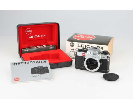 A Leica R4 35mm SLR Camera,chrome, serial no. 1604117, body G, shutter sounds accurate when tested with batteries, with maker