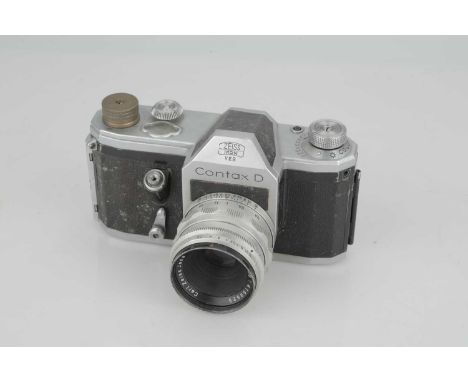 A Zeiss Ikon Contax D SLR Camera,with Carl Zeiss Tessar f/2.8 50mm lens, body, F-G, shutter working, lens, F-G, some light in