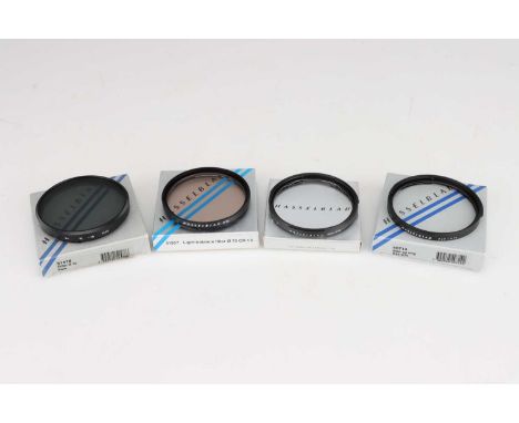 A Small Selection of Hasselblad Accessories,including Step-up ring 40714 (2), Light Balance Filter CR 1.25 51357 and Pola 515