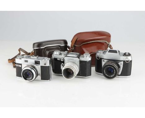 A Wirgin Edixa Flex 35mm SLR Camera,chrome, body G, shutter working, lens F, haze and fungus present. Also with a Ihagee Exa 