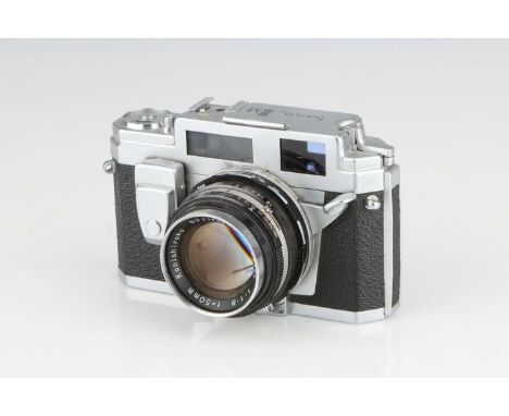 A Konica IIIM Rangefinder Camera,with Hexanon f/1.8 50mm lens, body, G-VG, shutter working, lens, G-VG, some light internal h